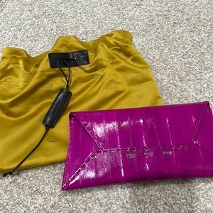 VBH clutch fuschia. Leather with suede inside.